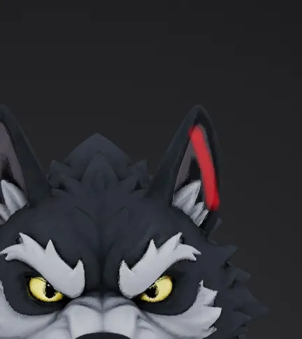 A red stroke along the edge of the wolf's ear