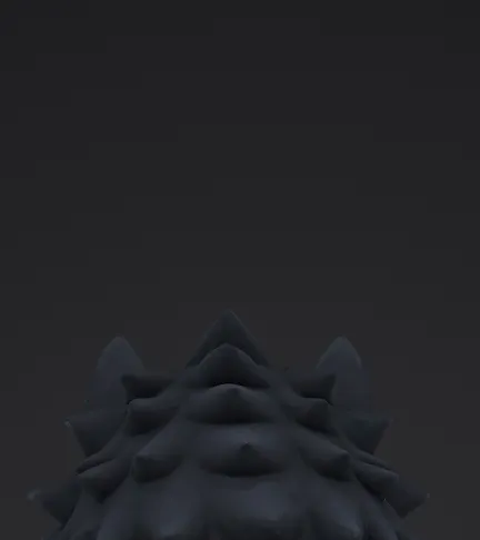 The back of the wolf's head with no paint on the ear