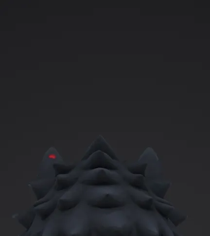 The back of the wolf's head with red paint at the ear tip